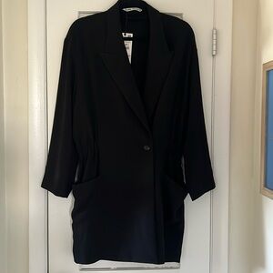 Black blazer dress that cinches at the waist. Zara circle tag.
